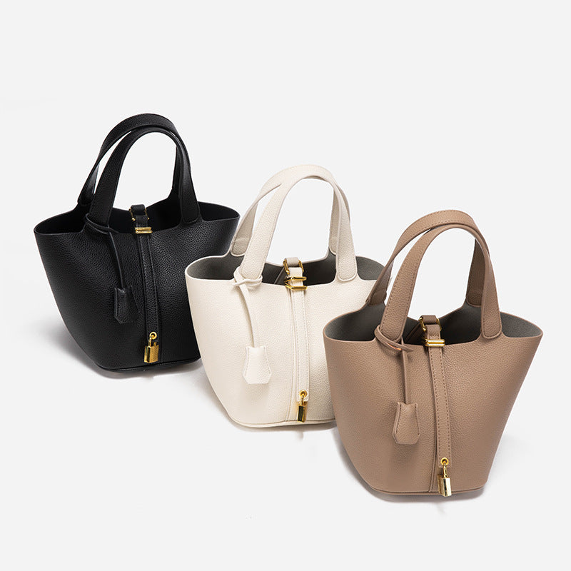 Elegant Women's Leather Tote Handbag with Gold Lock Detail 